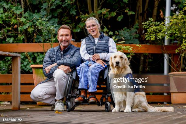 Host Jochen Bendel and Frieda Krieger and her dog Ayden during the Purina appeal campaign for VITA Assistenzhunde on September 28, 2021 in Huemmerich...