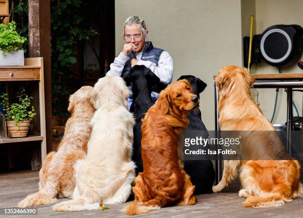 Frieda Krieger and VITA dogs during the Purina appeal campaign for VITA Assistenzhunde on September 28, 2021 in Huemmerich near Bonn, Germany.