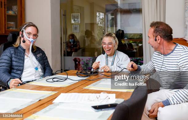 Nina, Frieda and TV host Jochen Bendel during the Purina appeal campaign for VITA Assistenzhunde on September 28, 2021 in Huemmerich near Bonn,...