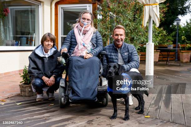 Founder Tatajana Kreidler, Nina Hoffmann with her dog Hazel and TV host Jochen Bendel during the Purina appeal campaign for VITA Assistenzhunde on...