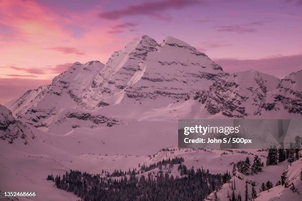 scenic view of snowcapped mountains against sky during sunset,aspen,colorado,united states,usa - aspen colorado winter stock pictures, royalty-free photos & images