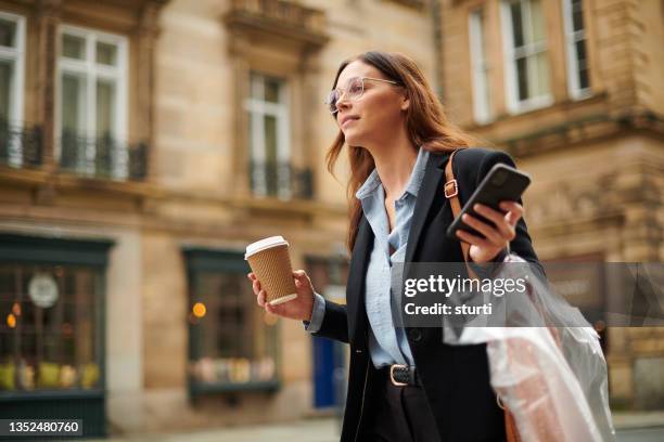 waiting for the rideshare - dry cleaning stock pictures, royalty-free photos & images