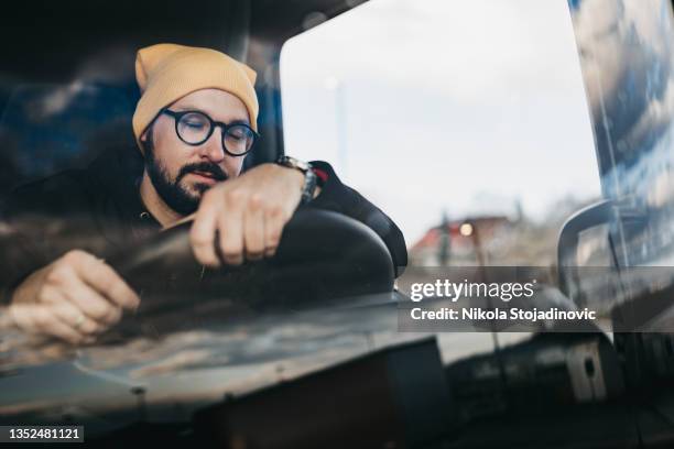 tired and sleepy truck driver - tired driver stock pictures, royalty-free photos & images