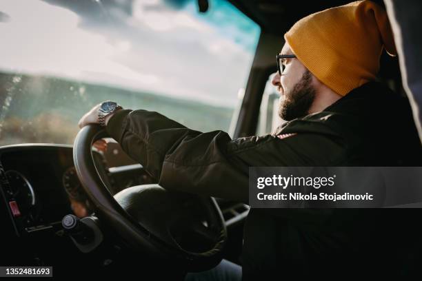 tired and sleepy truck driver - truck driver stock pictures, royalty-free photos & images