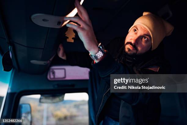 the truck driver checks the papers - loading dock ramps stock pictures, royalty-free photos & images