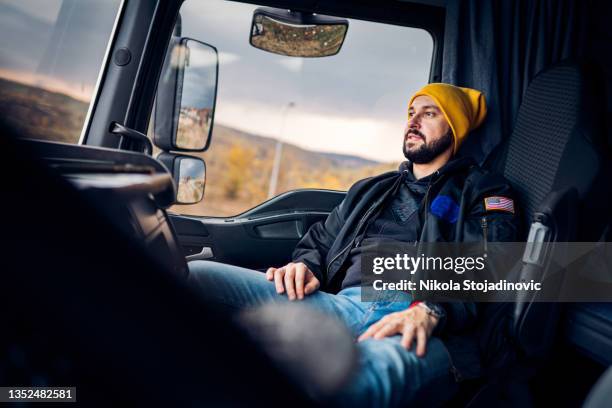 the truck driver checks the papers - loading dock ramps stock pictures, royalty-free photos & images