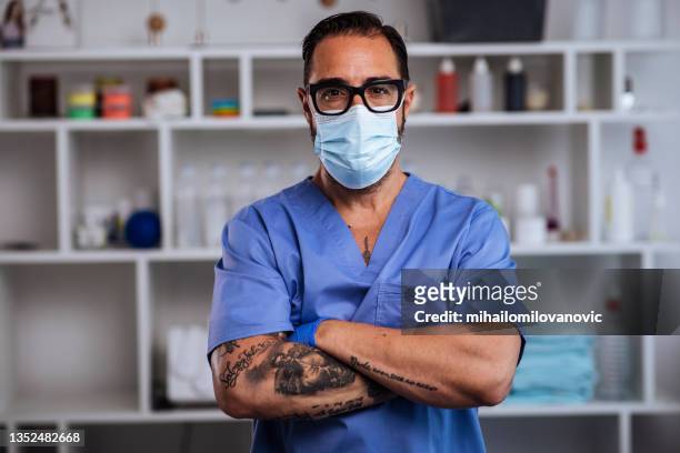 524 Doctors With Tattoos Photos and Premium High Res Pictures - Getty Images
