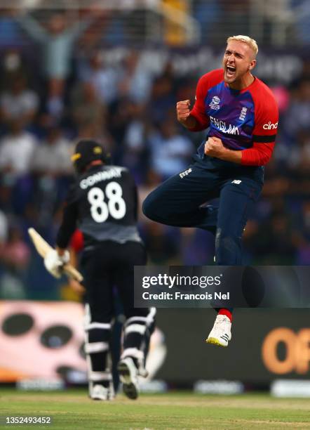 Liam Livingstone of England celebrates the wicket of Devon Conway of New Zealand during the ICC Men's T20 World Cup semi-final match between England...