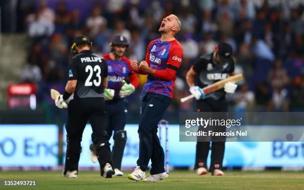 Liam Livingstone of England celebrates the wicket of Glenn Phillips of New Zealand during the ICC Men's T20 World Cup semi-final match between...