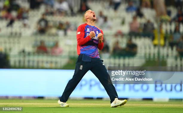 Liam Livingstone of England celebrates the wicket of Glenn Phillips of New Zealand during the ICC Men's T20 World Cup semi-final match between...