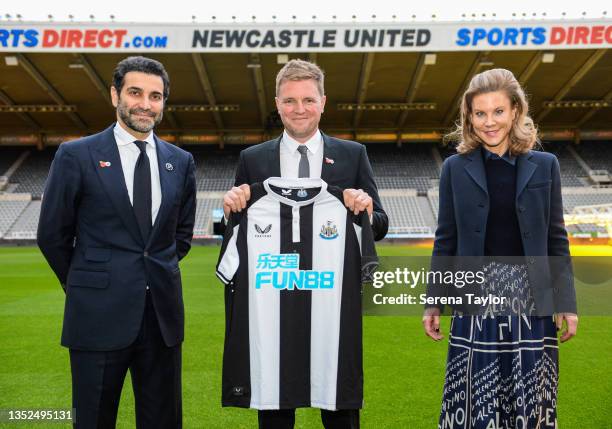 Newcastle United Head Coach Eddie Howe poses for a photograph holding a home shirt with Chief Executive Officer of PCP Capital Partners Amanda...