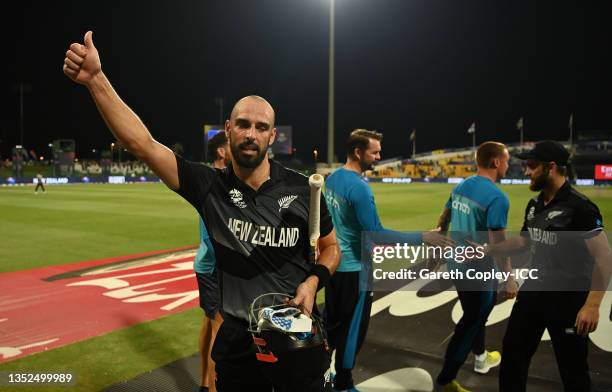 Daryl Mitchell of New Zealand celebrates following during the ICC Men's T20 World Cup semi-final match between England and New Zealand at Sheikh...