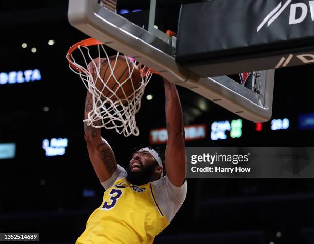 Anthony Davis of the Los Angeles Lakers dunks during a 126-123 Lakers overtime win over the Charlotte Hornets at Staples Center on November 08, 2021...