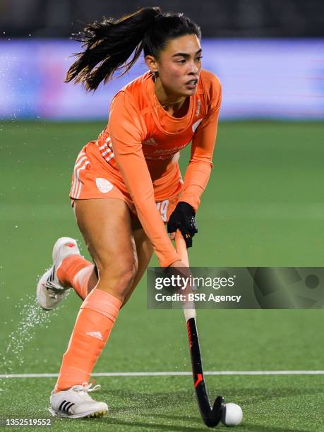 Stella van Gils of The Netherlands runs with the ball during the Women's FIH Pro League match between Netherlands and Belgium at Wagener Hockey...