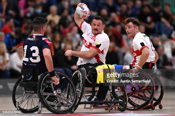 Seb Bechara takes on Nicolas Clausells of France during the International Wheelchair Rugby League Test Series between England and France at Medway...