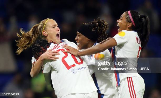 Janice Cayman of Lyon celebrates with team mates after scoring her team's first goal during the UEFA Women's Champions League group D match between...