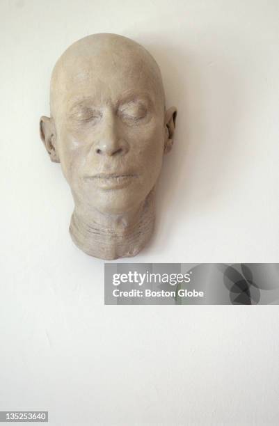 Death mask of the late E.E. Cummings hangs on an office wall in Forsyth Chapel in Forest Hills Cemetery in Boston. Cummings died in 1962.