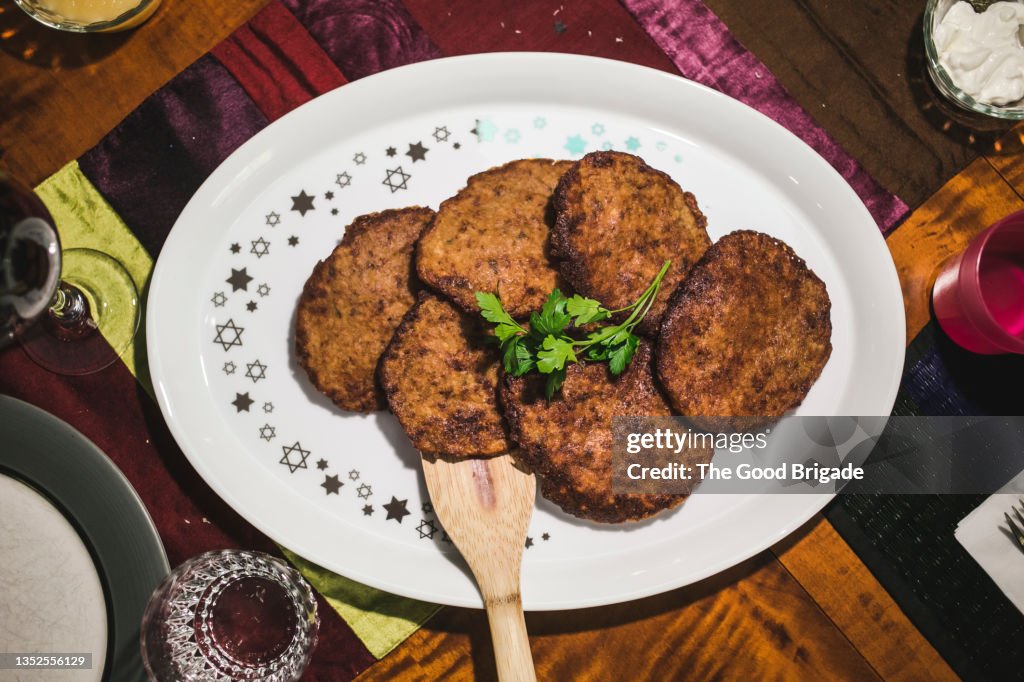 High angle view of potato pancakes on dinner table