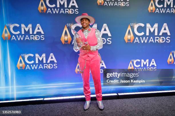 Jimmie Allen poses with his award for the 55th annual Country Music Association awards at the Bridgestone Arena on November 10, 2021 in Nashville,...