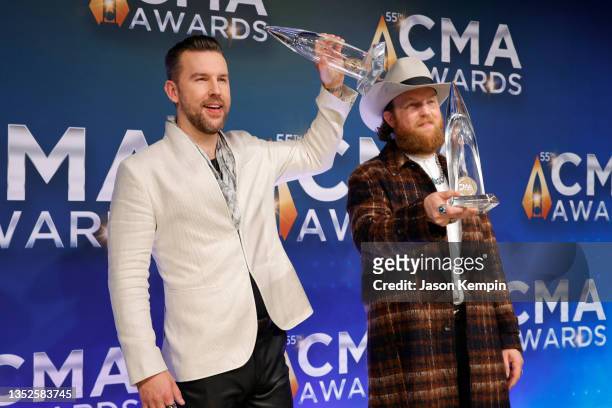 Osborne and John Osborne of Brothers Osborne pose with their awards for the 55th annual Country Music Association awards at the Bridgestone Arena on...