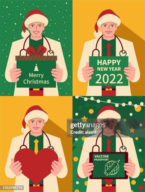 happy handsome young doctor dressed in a santa claus suit holding a christmas present and new year greeting card and heart shape sign and digital tablet - male nurse stock illustrations