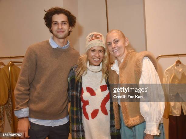 Actor Liam Hellmann, Rachel Bourlier and Gabriella Cortese Rioufol attend Marie Perron Painting Preview at Antik Batik on November 10, 2021 in Paris,...