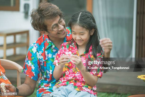 songkran family festival day at thailand. - heritage month stock pictures, royalty-free photos & images