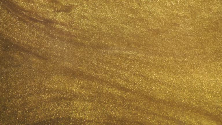 https://media.gettyimages.com/id/1352607132/video/golden-liquid-background-light-sunny-yellow-gradient-abstract-gold-liquid-wave.jpg?b=1&s=640x640&k=20&c=4fo0dA4XOdB96Y4QWi3bAfxdeJXKZs_Utdhz2jpwF-0=