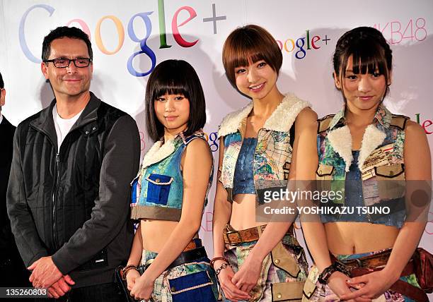 Google vice president Bradley Horowitz smiles with Japanese all-girl pop group AKB48 members Atsuko Maeda , Mariko Shinoda and Aki Takajo as they...