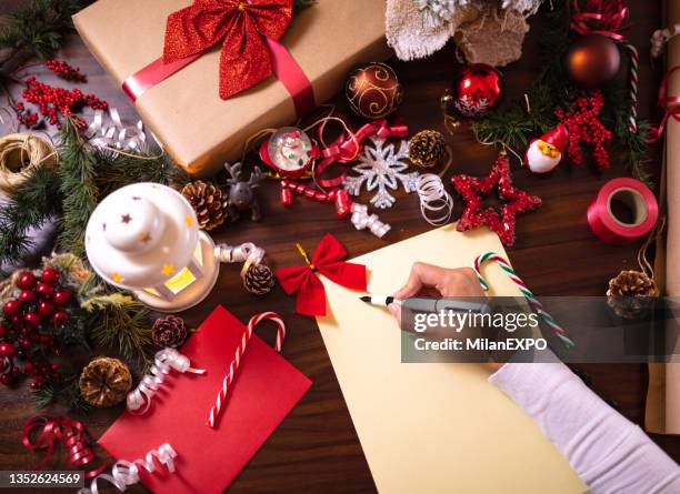 writing down christmas wishes - wishlist stock pictures, royalty-free photos & images