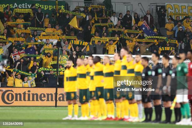 The Socceroos supporters in the crowd sing the anthem during the FIFA World Cup AFC Asian Qualifier match between the Australia Socceroos and Saudi...