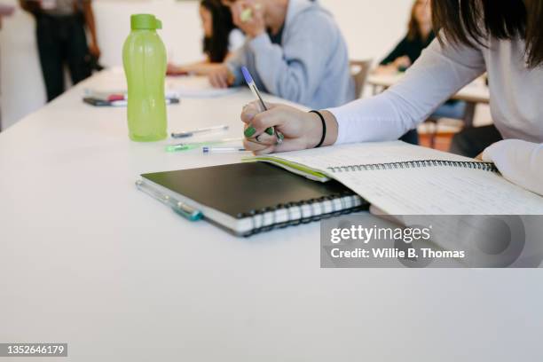 Student Using Notebook Paper 1,526 High School Notebook Paper Stock Photos, High-Res Pictures, and ...