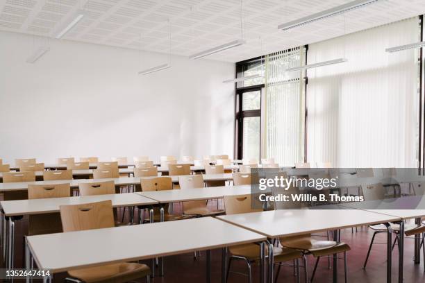 empty high school classroom - abandoned school building stock pictures, royalty-free photos & images