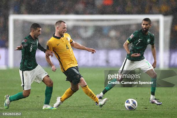 Mitchell Duke of the Socceroos passes during the FIFA World Cup AFC Asian Qualifier match between the Australia Socceroos and Saudi Arabia at...