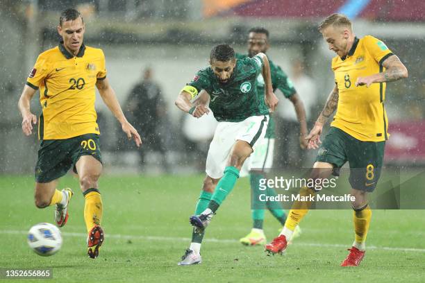 Salman Alfaraj of Saudi Arabia shoots during the FIFA World Cup AFC Asian Qualifier match between the Australia Socceroos and Saudi Arabia at...