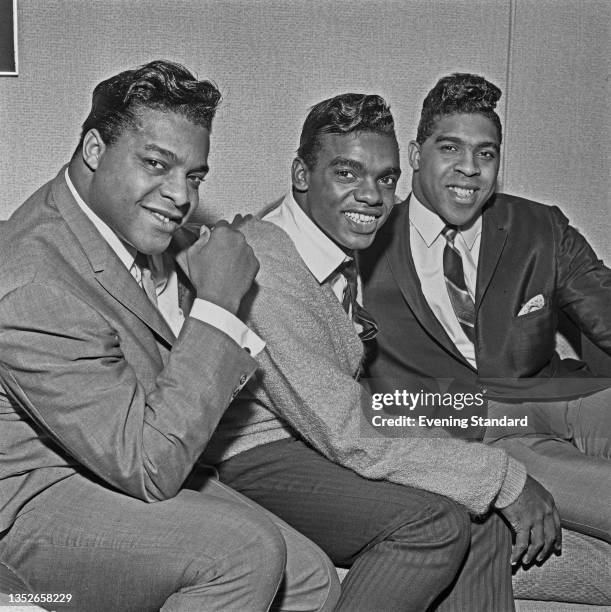 American vocal trio the Isley Brothers, UK, 24th October 1964. From left to right, they are brothers O'Kelly Isley Jr., Ronald Isley and Rudolph...