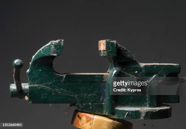 heavy-duty metal vice or clamp - clamp stock pictures, royalty-free photos & images