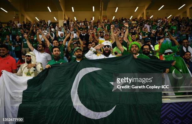 Pakistan fans react in the crowd during the ICC Men's T20 World Cup semi-final match between Pakistan and Australia at Dubai International Stadium on...