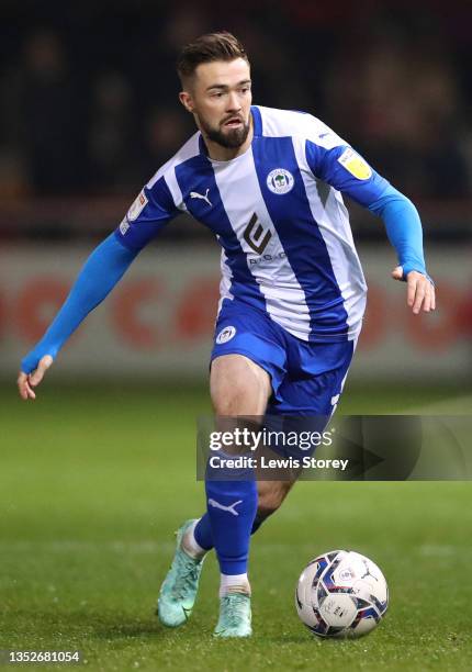 Gwion Edwards of Wigan Athletic runs with the ball during the Sky Bet League One match between Fleetwood Town and Wigan Athletic at Highbury Stadium...
