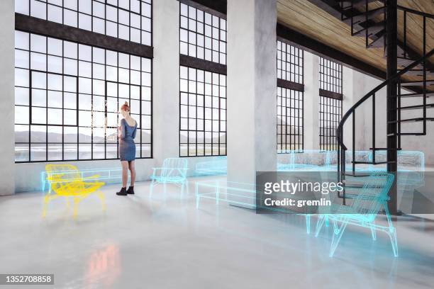 augmented reality with woman decorating empty house - smartphone hologram stockfoto's en -beelden