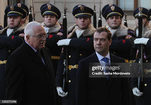 Russian President Dmitry Medvedev listens to Czech President Vaclav Claus during their meeting on December 8 ,2011 in Prague, Czech Republic....