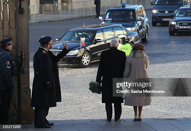Czech President Vaclav Claus and his wife Livia Rosamunda Clausova greet Russian President Dmitry Medvedev's car during a visit to the city on...