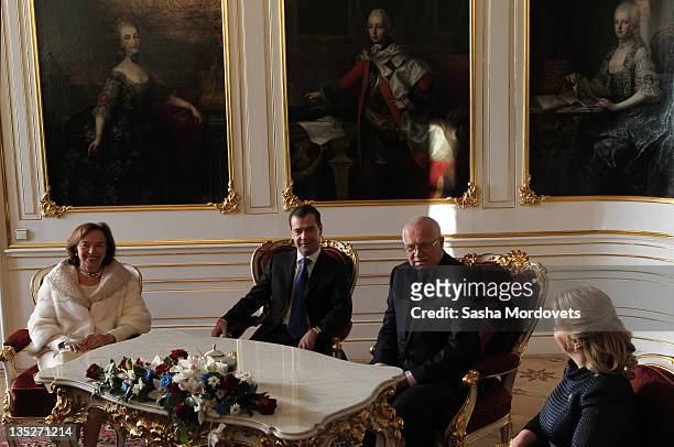 Russian President Dmitry Medvedev , his spouse Svetlana Medvedeva , Czech President Vaclav Claus and his wife Livia Rosamunda Clausova meet during a...