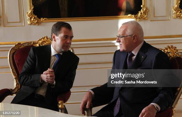 Russian President Dmitry Medvedev talks to Czech President Vaclav Claus look on during their meeting on December 8 ,2011 in Prague, Czech Republic....