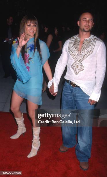 American actress & singer Jennifer Lopez and actor & choreographer Cris Judd attend an after party following the 47th annual Grammy Awards at...