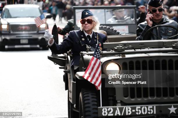 Military, police, high school bands and others march in the Veterans Day Parade on November 11, 2021 in New York City. After being canceled last year...