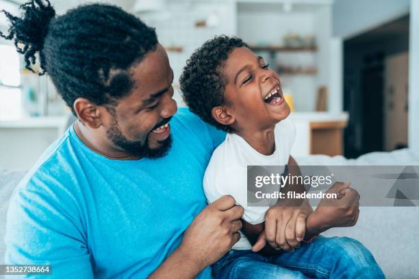 father and son - tickling stock pictures, royalty-free photos & images