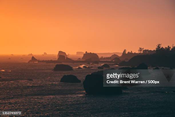 scenic view of sea against clear sky during sunset,crescent city,california,united states,usa - crescent city stock pictures, royalty-free photos & images
