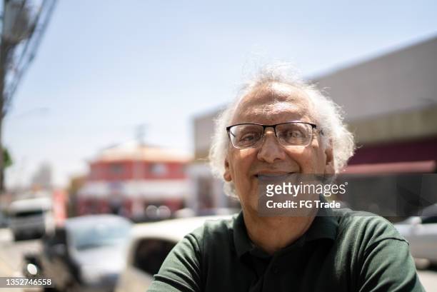 portrait of a senior man outdoors - ugly people stock pictures, royalty-free photos & images