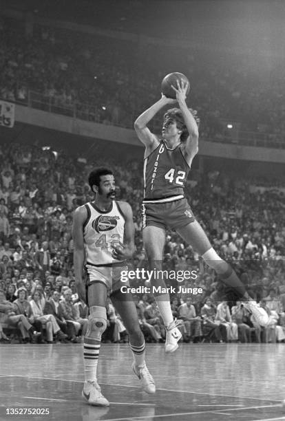 Portland Trail Blazers forward Wally Walker shoots a running jumper against forward Willie Wise during an NBA playoff game against the Denver Nuggets...